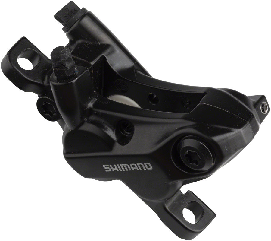 Pinza de freno de disco Shimano BR-MT520 de 4 pistones con pastillas metálicas delanteras y traseras negras