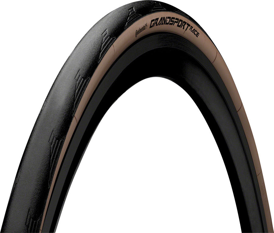 Neumático de competición Continental Grand Sport - 700 x 28 Clincher plegable negro/marrón PureGrip NyTech Breaker