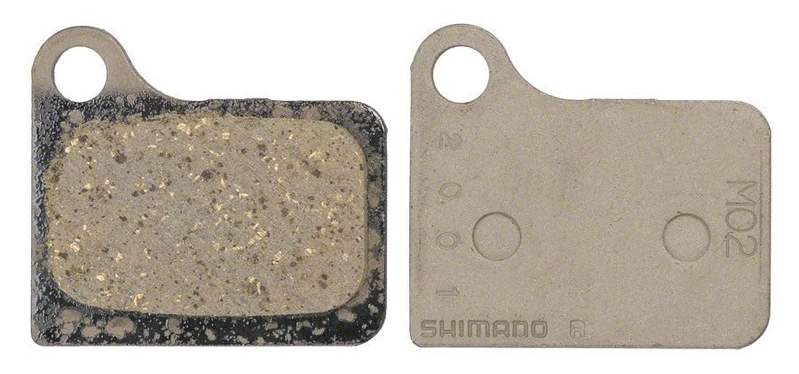 Pastillas de freno de disco de resina Shimano M02 y resorte para pinzas Deore BR-M555