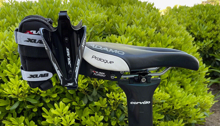 XLAB Turbo Wing con portabotellas de xenón, sistema de transporte doble para botellas de agua montado en el sillín